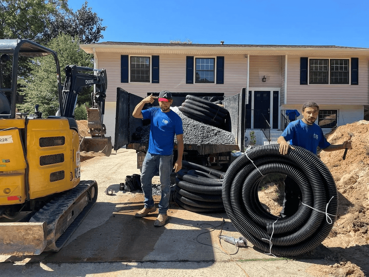 Drainage crew with excavator